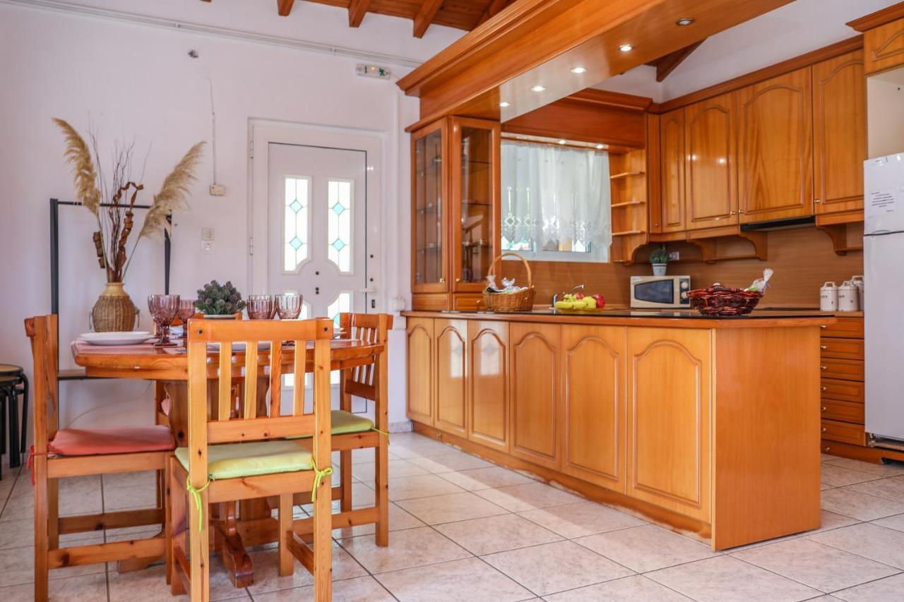Villa Mitzelos Moni Evaggelistrias Exteriör bild