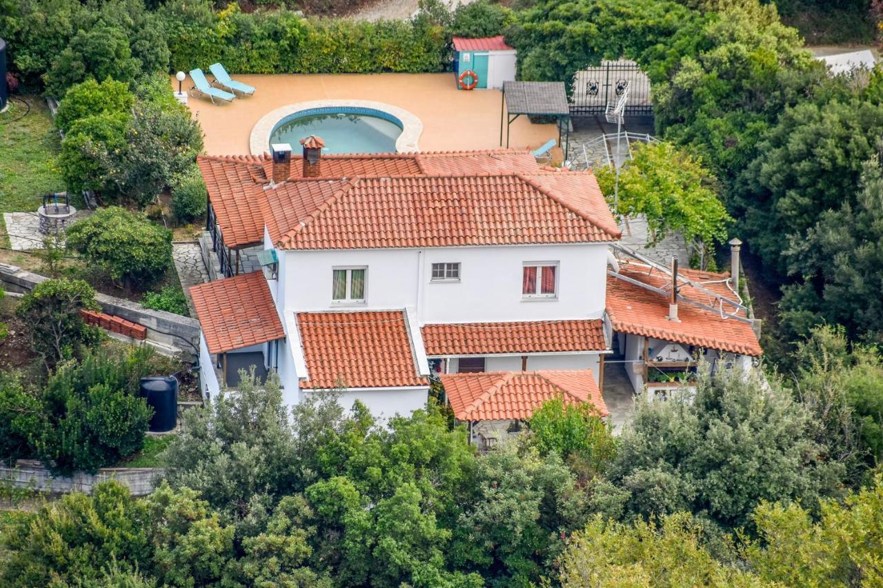 Villa Mitzelos Moni Evaggelistrias Exteriör bild
