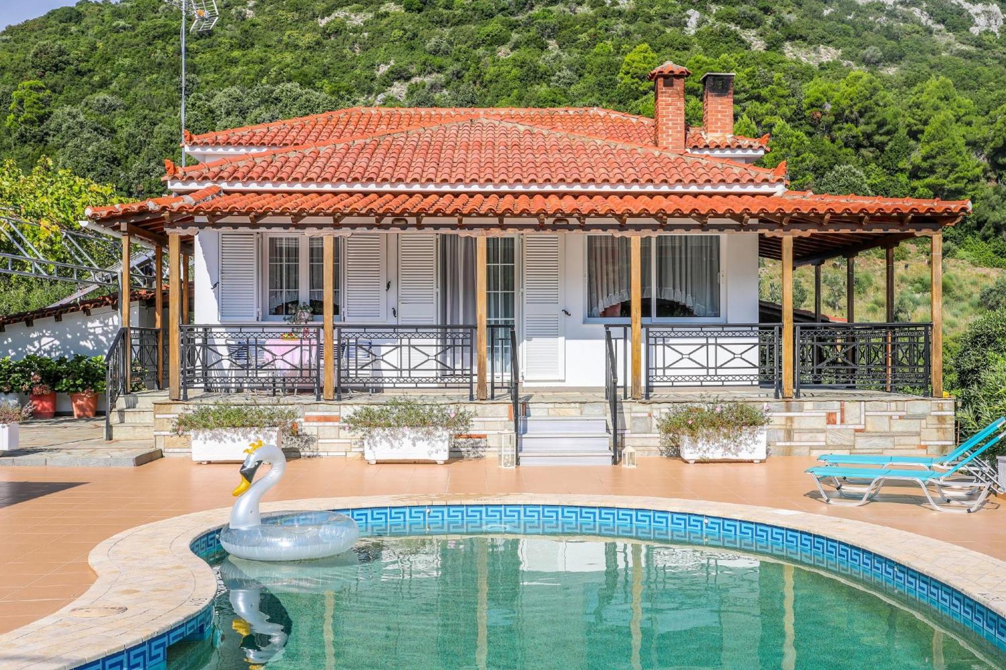 Villa Mitzelos Moni Evaggelistrias Exteriör bild